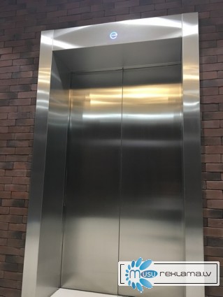 Облицовка нержавейкой лифтовых порталов.